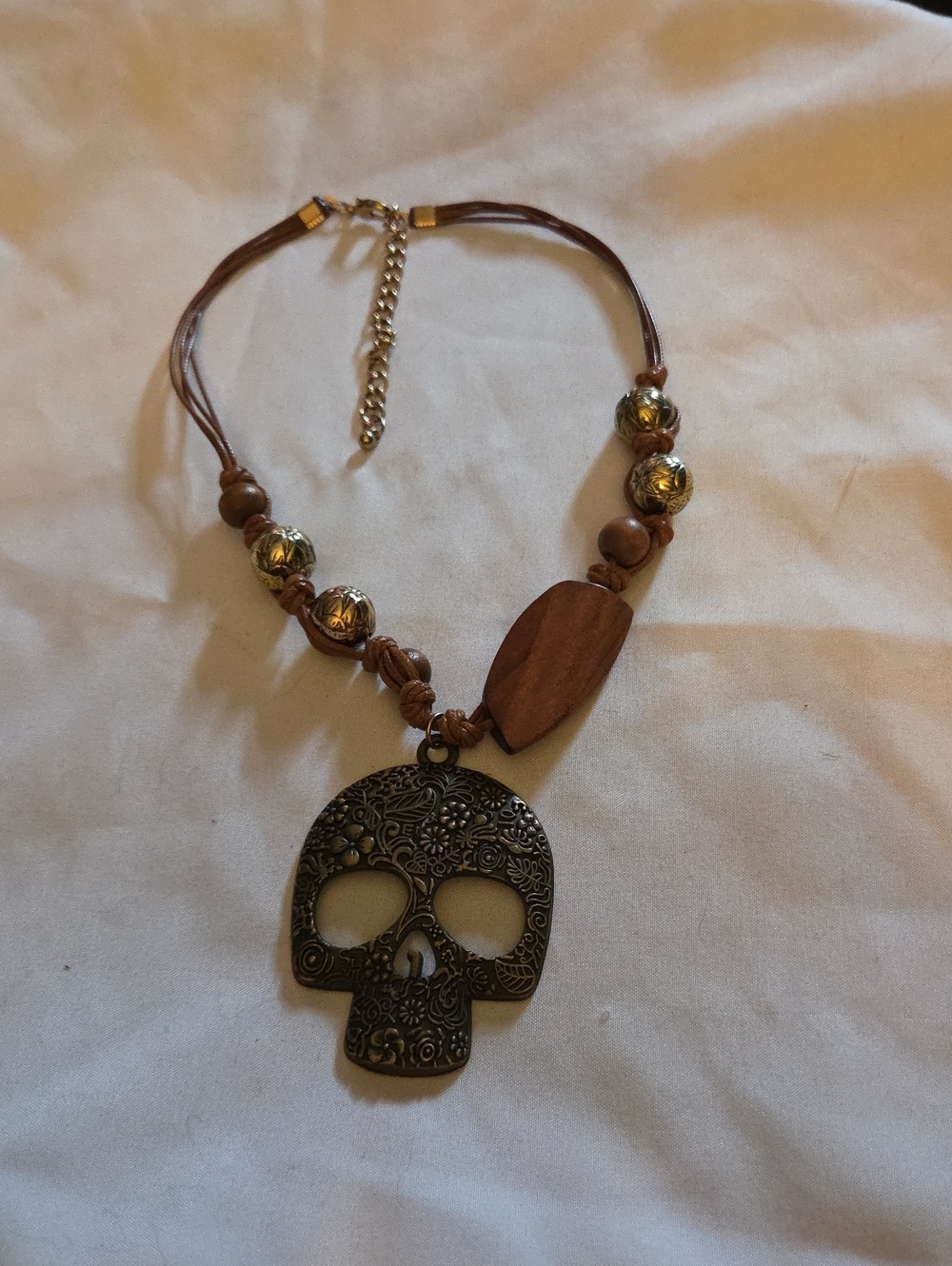 Brown Wood Bead Necklace with Antique Gold Floral Skull Pendant
